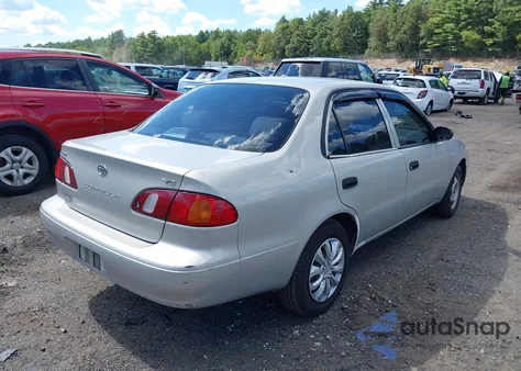 2000 Toyota Corolla Ve z USA, uszkodzony, nr VIN 2T1BR12E6YC309972